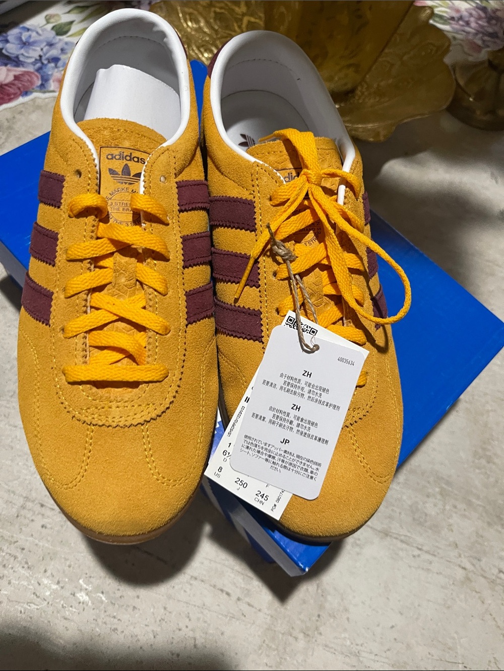 adidasSuede Sneakers in Mustard Yellow with Burgundy Stripes